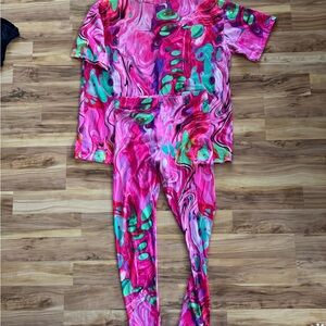 Brand new with tags plus size 1x Fashion Nova Pink & Green set top and leggings